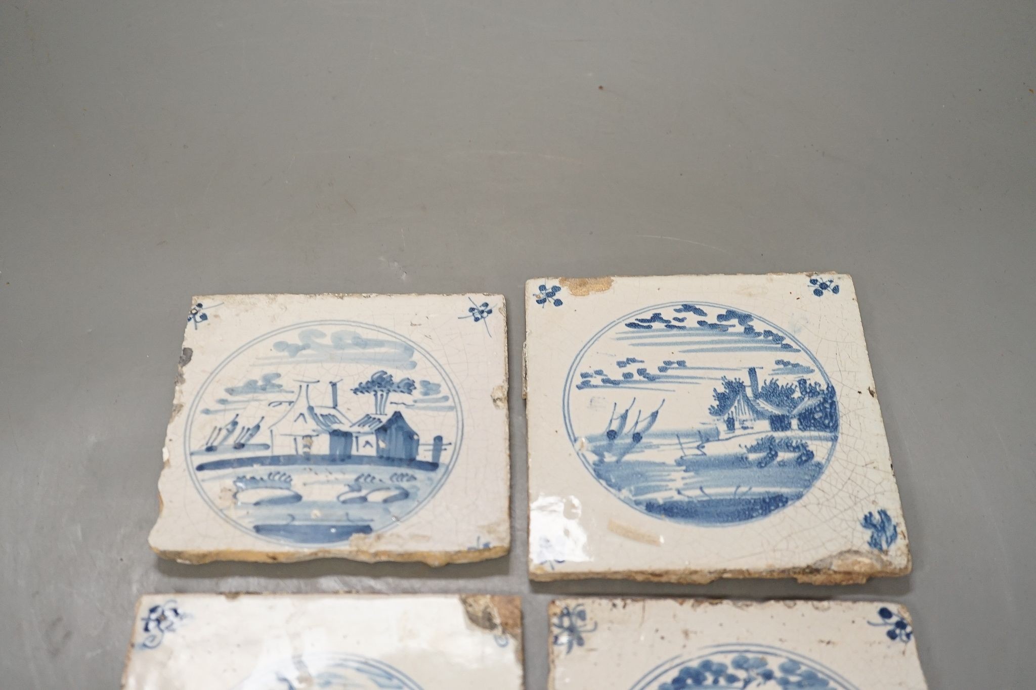 Eight various 18th and 19th century Delft tiles, 13cm